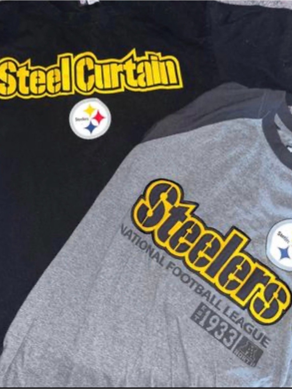 2 men's Pittsburgh Steelers medium shirts short sleeve